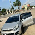 Vender: Kia Rio cinza